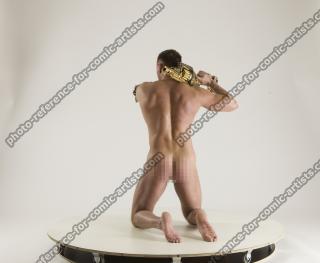 2020 01 MICHAEL NAKED MAN KNEELING POSE WITH GUNS (7)